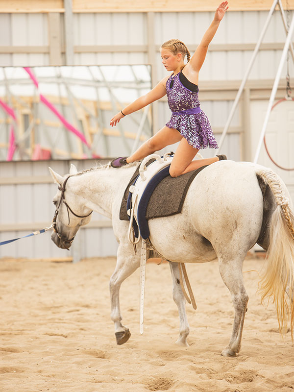 Girl vaulting at Nation Valley Ranch in Chesterville, Ontario